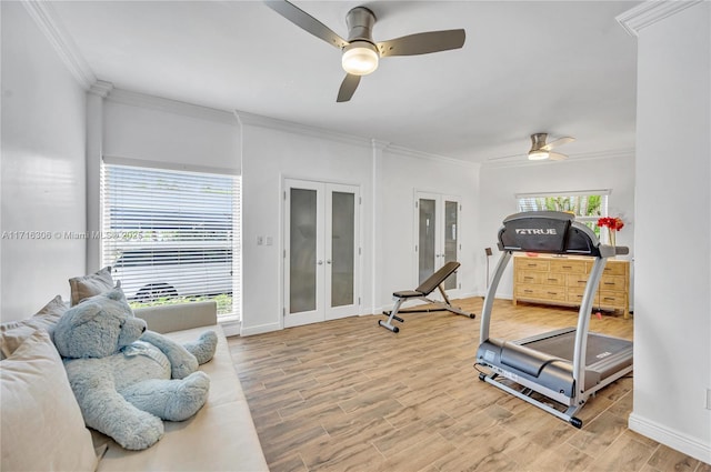 workout area with french doors, ceiling fan, crown molding, and hardwood / wood-style floors