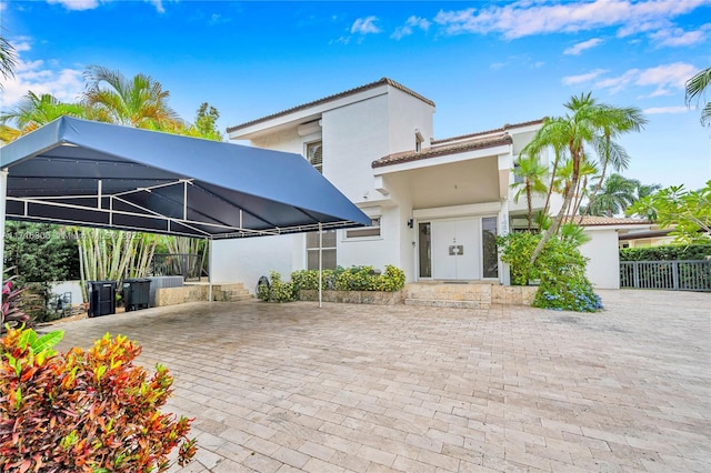 view of front of property with a carport