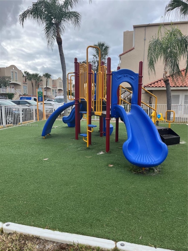 view of play area with a yard