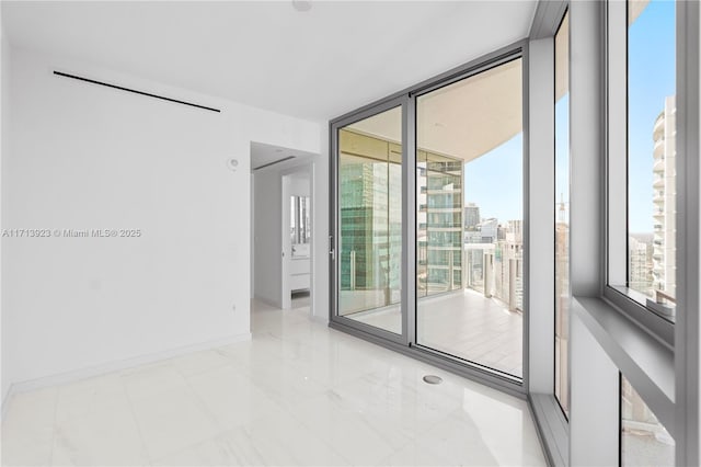 300 Biscayne Blvd Way Unit 4407, Miami, FL 33131 - unfurnished room featuring floor to ceiling windows and baseboards