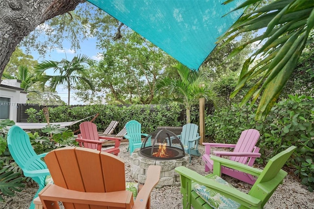 view of patio / terrace with an outdoor fire pit