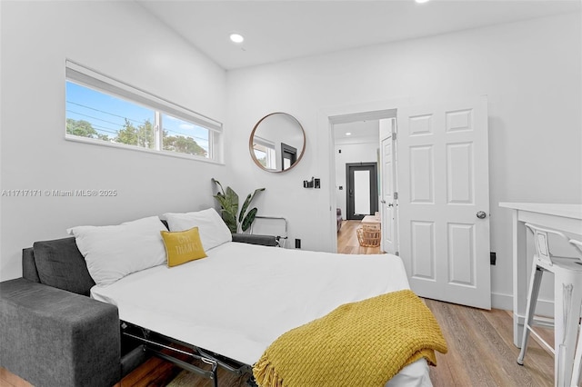 bedroom featuring light hardwood / wood-style floors