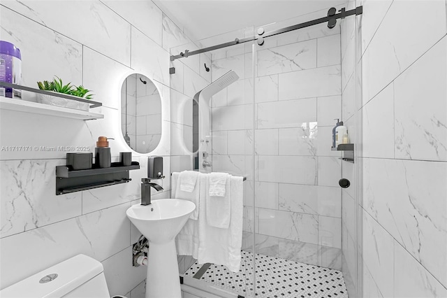 bathroom with walk in shower and toilet