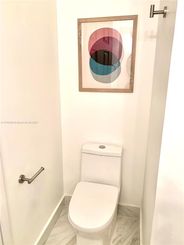 bathroom featuring toilet