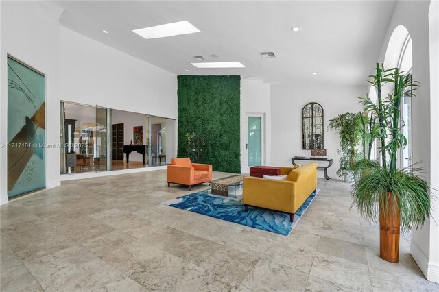 13431 Old Sheridan St, Southwest Ranches, FL 33330 - community lobby featuring high vaulted ceiling and recessed lighting