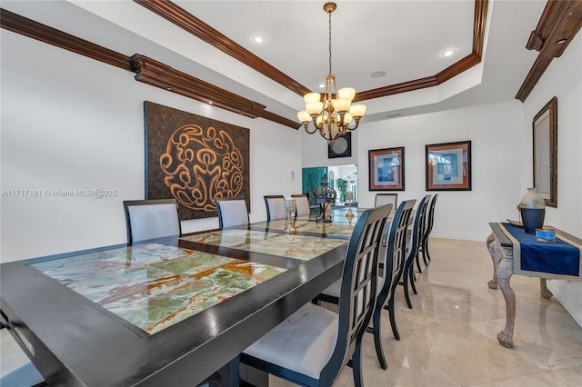 dining space featuring crown molding, a tray ceiling, baseboards, a notable chandelier, and marble finish floor