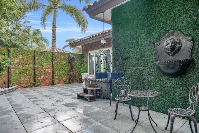 view of patio / terrace with fence