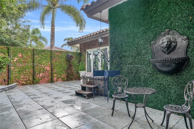 13431 Old Sheridan St, Southwest Ranches, FL 33330 - fenced backyard with a patio