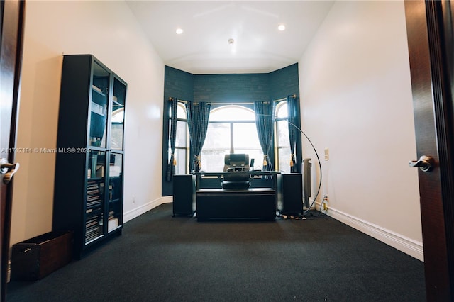 interior space featuring recessed lighting and baseboards