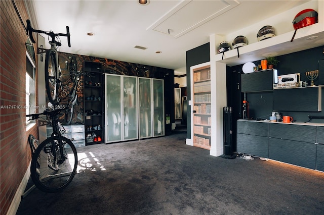 garage featuring visible vents and recessed lighting