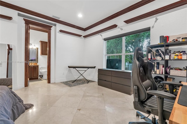 office area with baseboards, visible vents, and crown molding