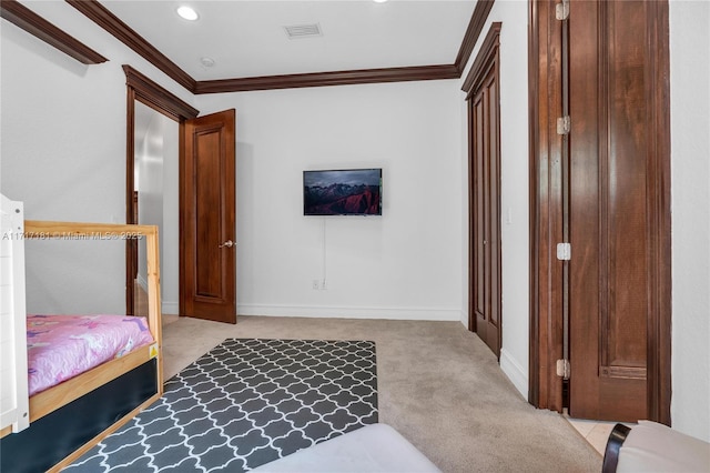 carpeted bedroom featuring ornamental molding, recessed lighting, visible vents, and baseboards