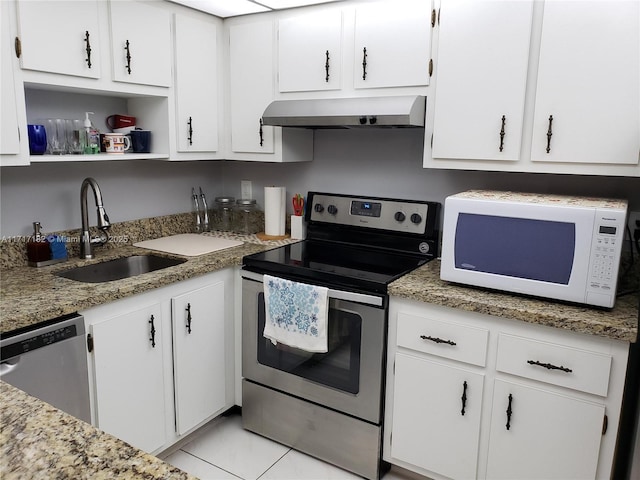 kitchen featuring white cabinetry, sink, stainless steel appliances, ventilation hood, and light tile patterned floors