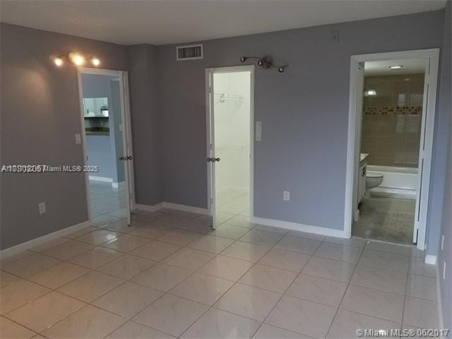 view of tiled empty room