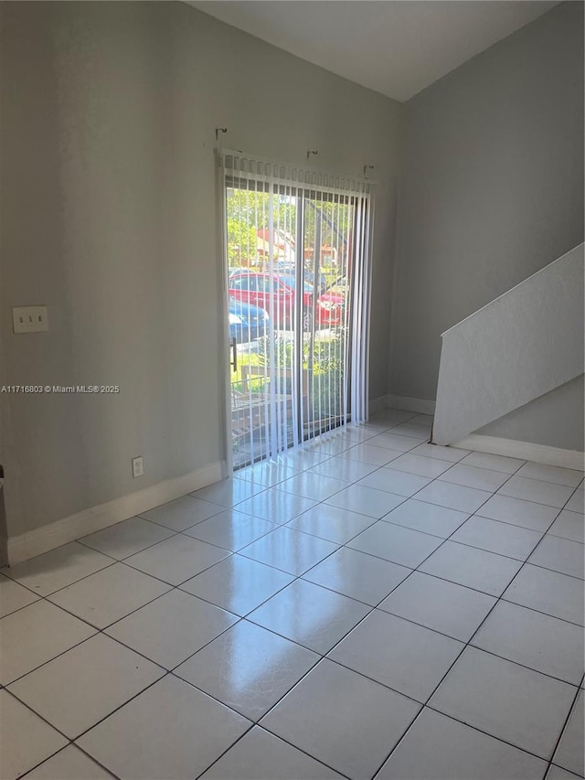 view of tiled spare room