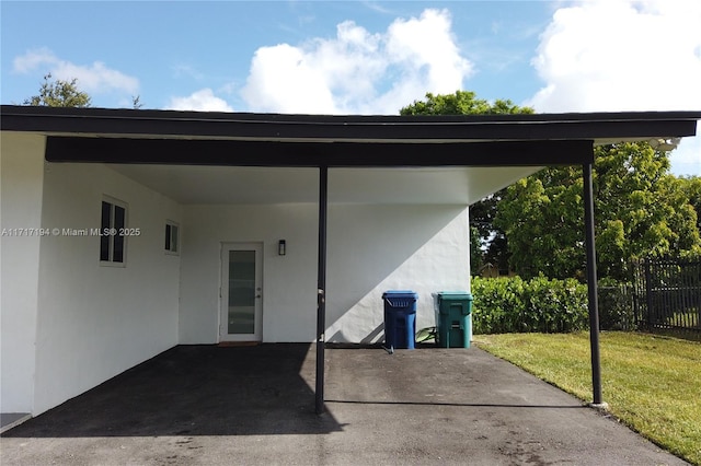 view of patio / terrace featuring a carport