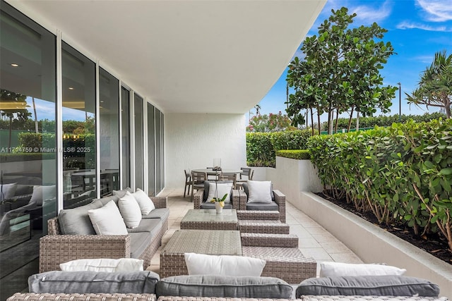 400 Alton Rd Unit 509, Miami Beach, FL 33139 - view of patio with an outdoor living space and outdoor dining area
