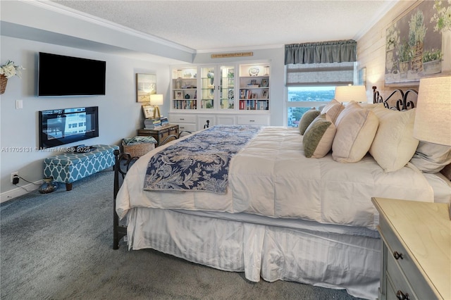 bedroom featuring carpet, a textured ceiling, and ornamental molding