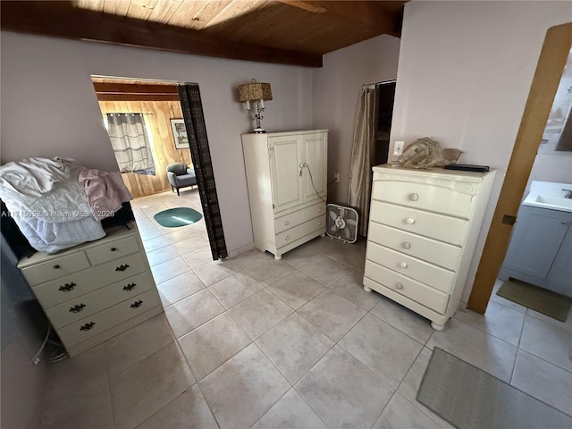 interior space featuring sink, beamed ceiling, and wood ceiling