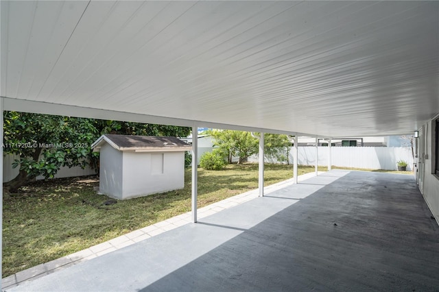 view of patio featuring a shed