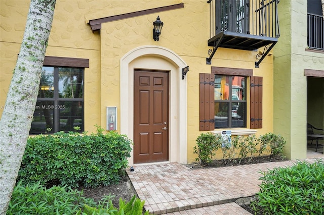 doorway to property with a balcony