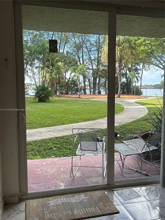 entryway featuring a water view