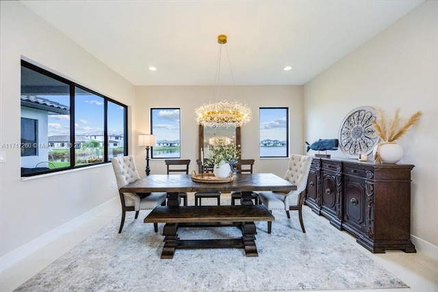 dining area with a notable chandelier