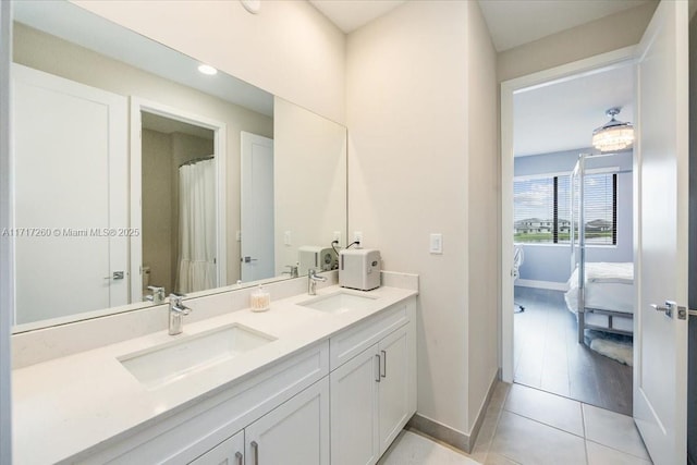 bathroom featuring vanity and tile patterned floors