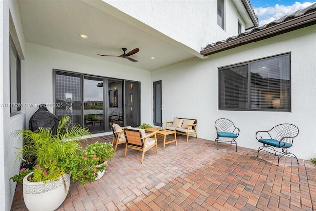 view of patio / terrace with outdoor lounge area and ceiling fan