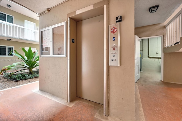 view of exterior entry with elevator