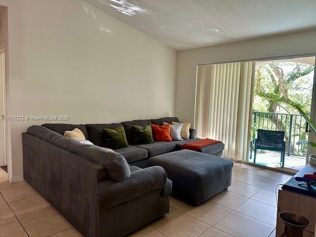 living room featuring light tile patterned floors