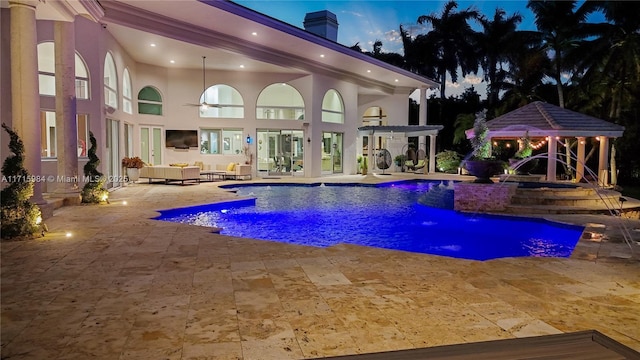 view of patio / terrace featuring a pergola and ceiling fan