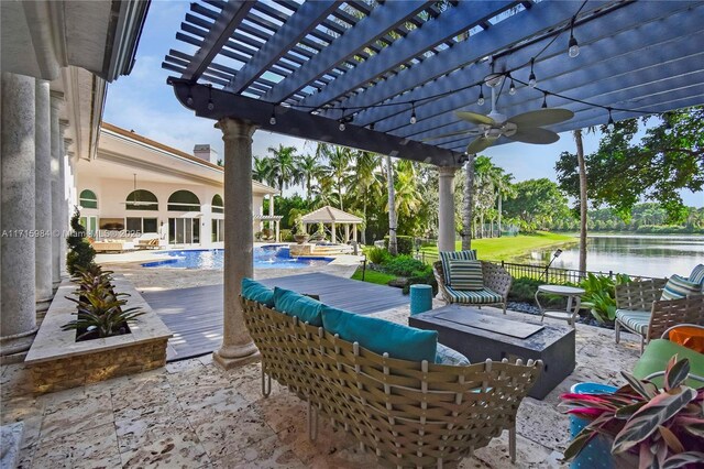 view of patio / terrace featuring an outdoor living space, a water view, a pergola, a gazebo, and ceiling fan