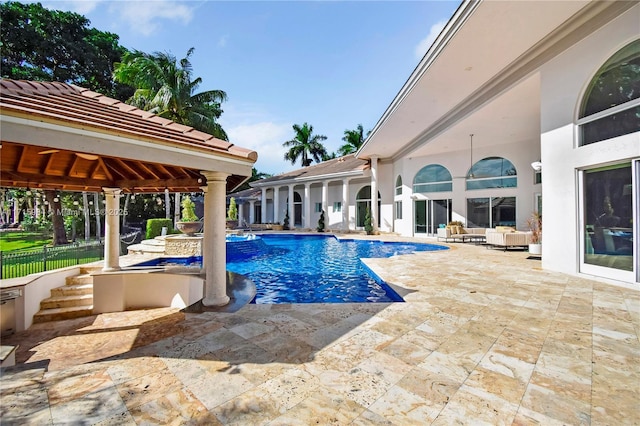 view of pool with a gazebo and a patio