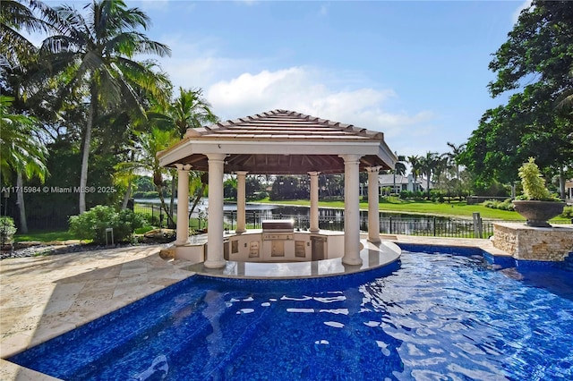 view of swimming pool with grilling area, a gazebo, area for grilling, a water view, and a patio