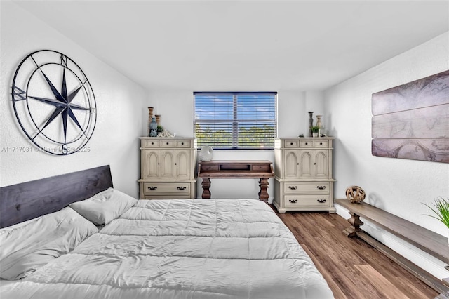 bedroom featuring light wood-type flooring