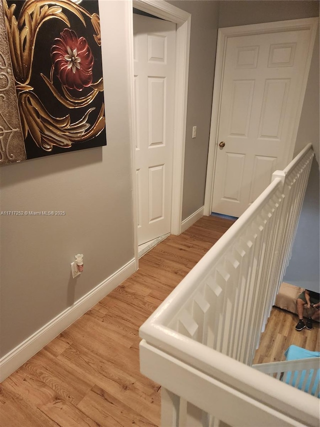 stairway with wood-type flooring