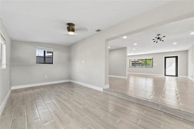 unfurnished room featuring ceiling fan