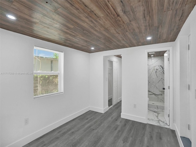 basement with wood ceiling and dark wood-type flooring