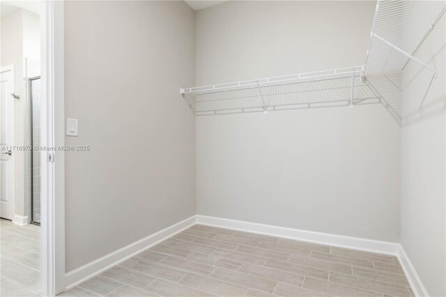 bathroom with a shower with shower curtain, vanity, and toilet