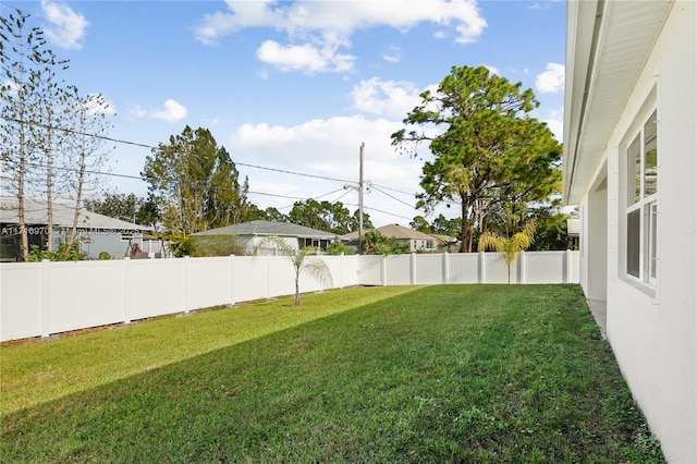 view of yard featuring a fenced backyard