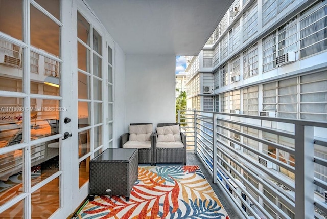 balcony featuring french doors