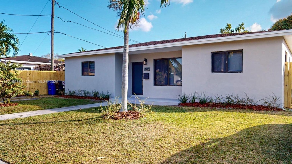 830 NE 171st St, North Miami Beach, FL 33162 - single story home with stucco siding