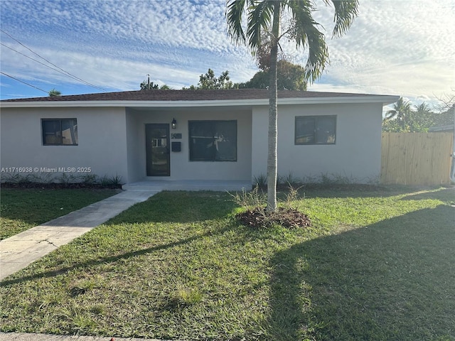 830 NE 171st St, North Miami Beach, FL 33162 - ranch-style home featuring stucco siding and a shingled roof
