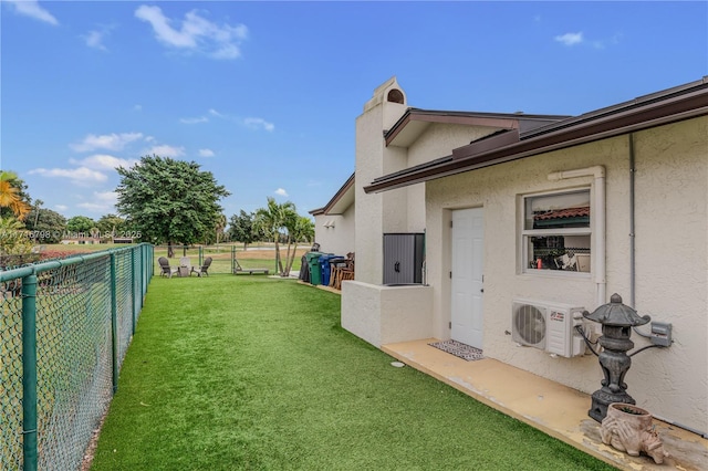 view of yard featuring ac unit