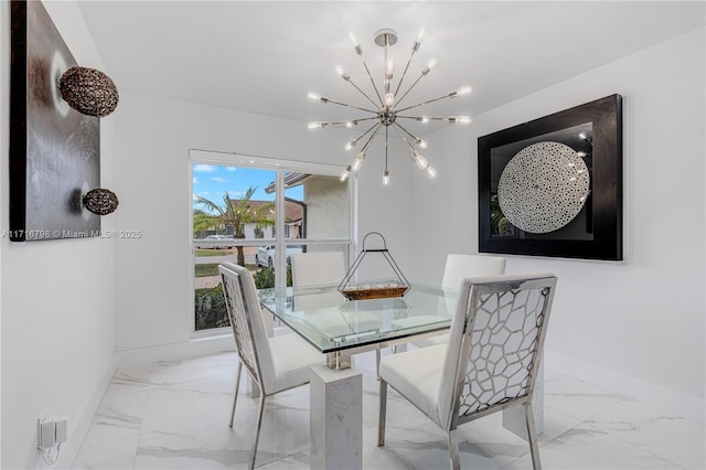 dining area with a notable chandelier