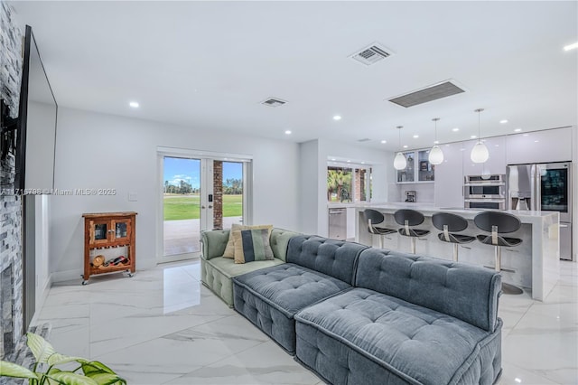 living room featuring french doors