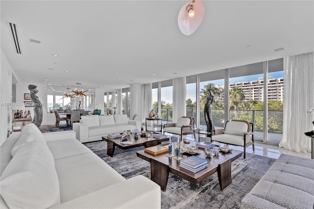 living room with floor to ceiling windows