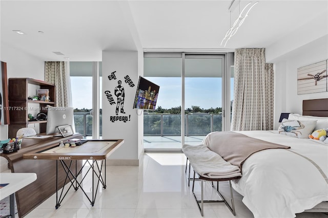 bedroom with light tile patterned floors, access to outside, and expansive windows