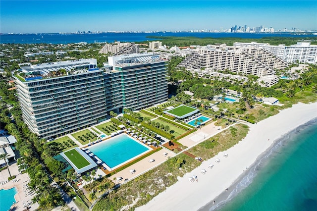 bird's eye view with a beach view and a water view